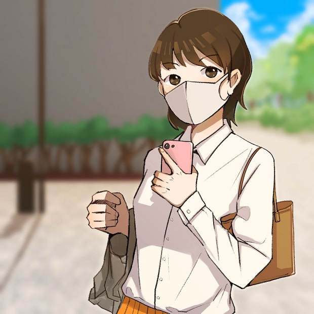 マスクをして外に出かける女性